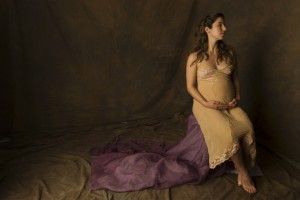 Studio portrait of a young pregnant woman